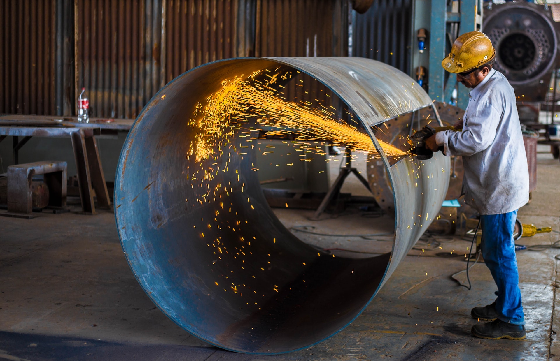 Welder completing a code compliant weld